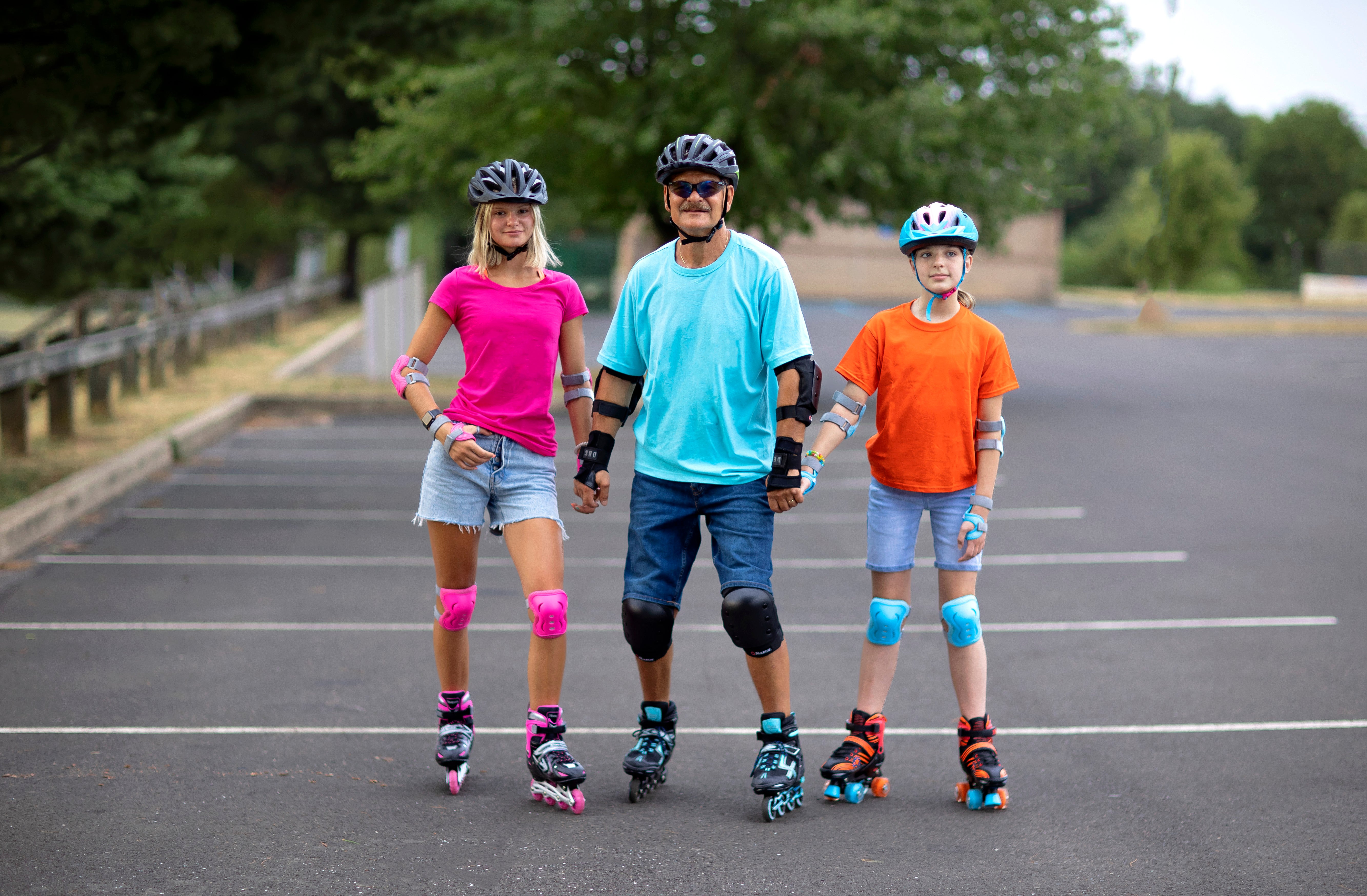 Man, teen and youth on interchangeable roller and inline skates