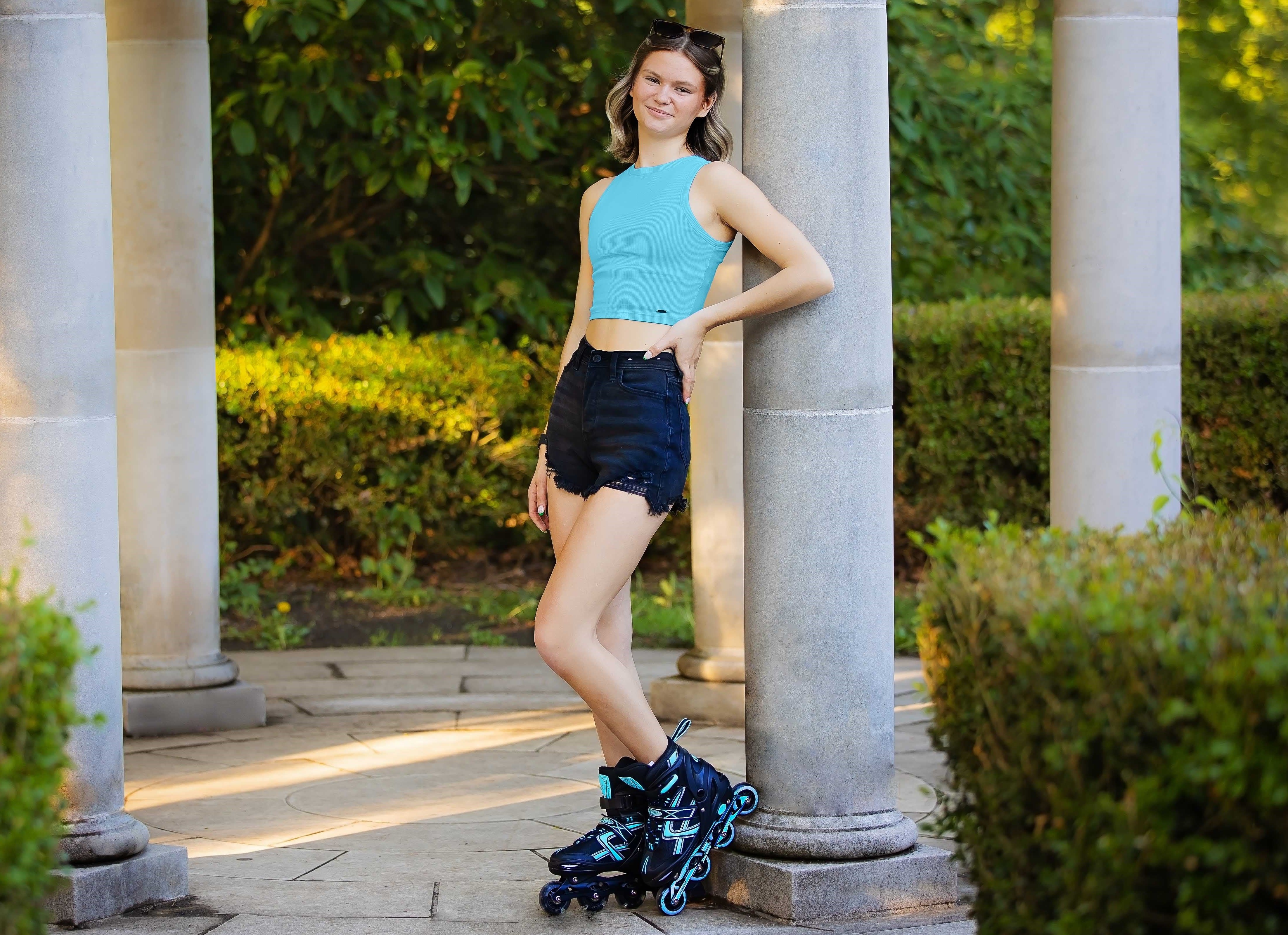 Girl with xino sports rollerblades